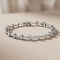 White Metal Round Moissanite Bracelet