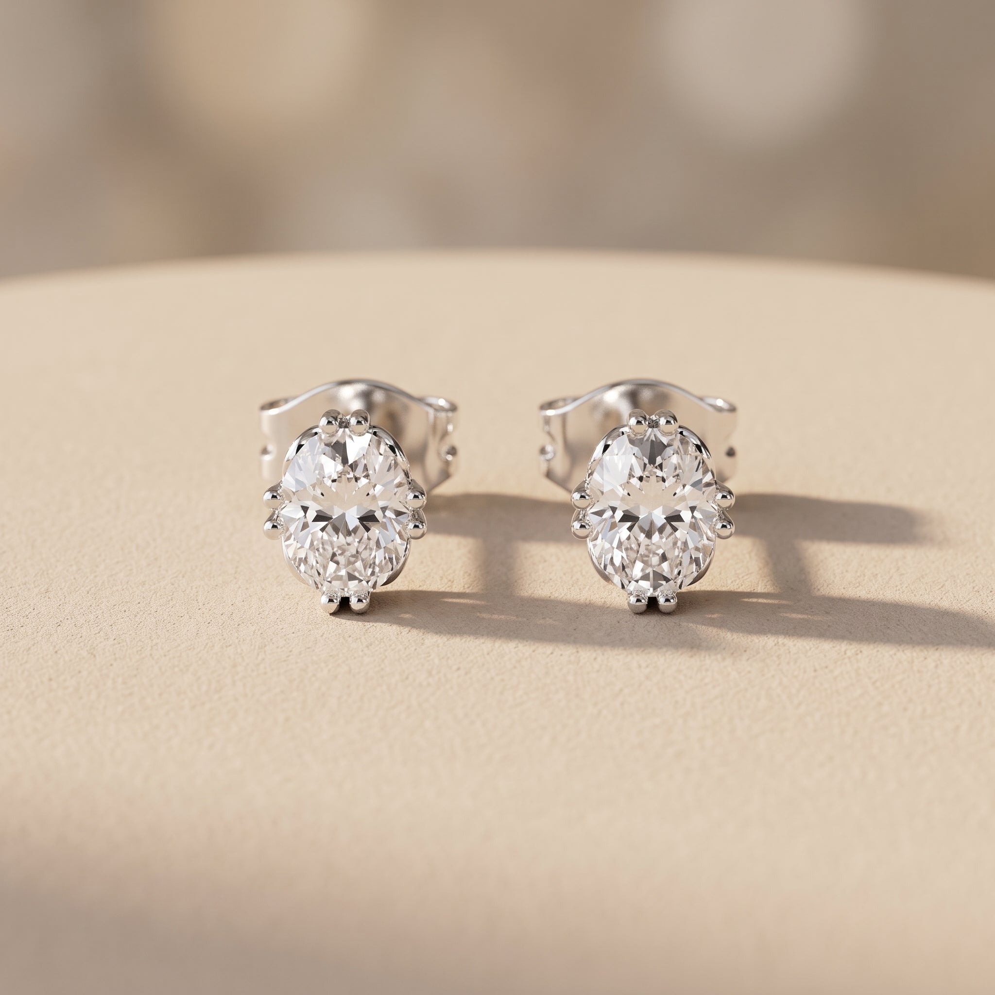 White Metal Oval Cut Moissanite Stud Earrings