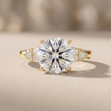 Yellow Gold Round Cut Moissanite Engagement Ring with Side Stones