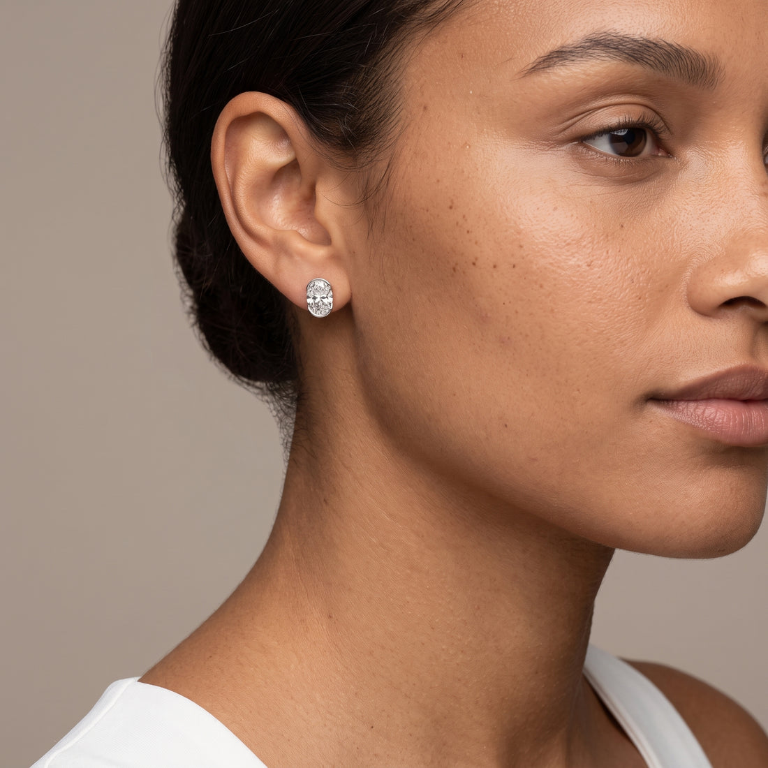 White Metal Oval Cut Moissanite Stud Earrings