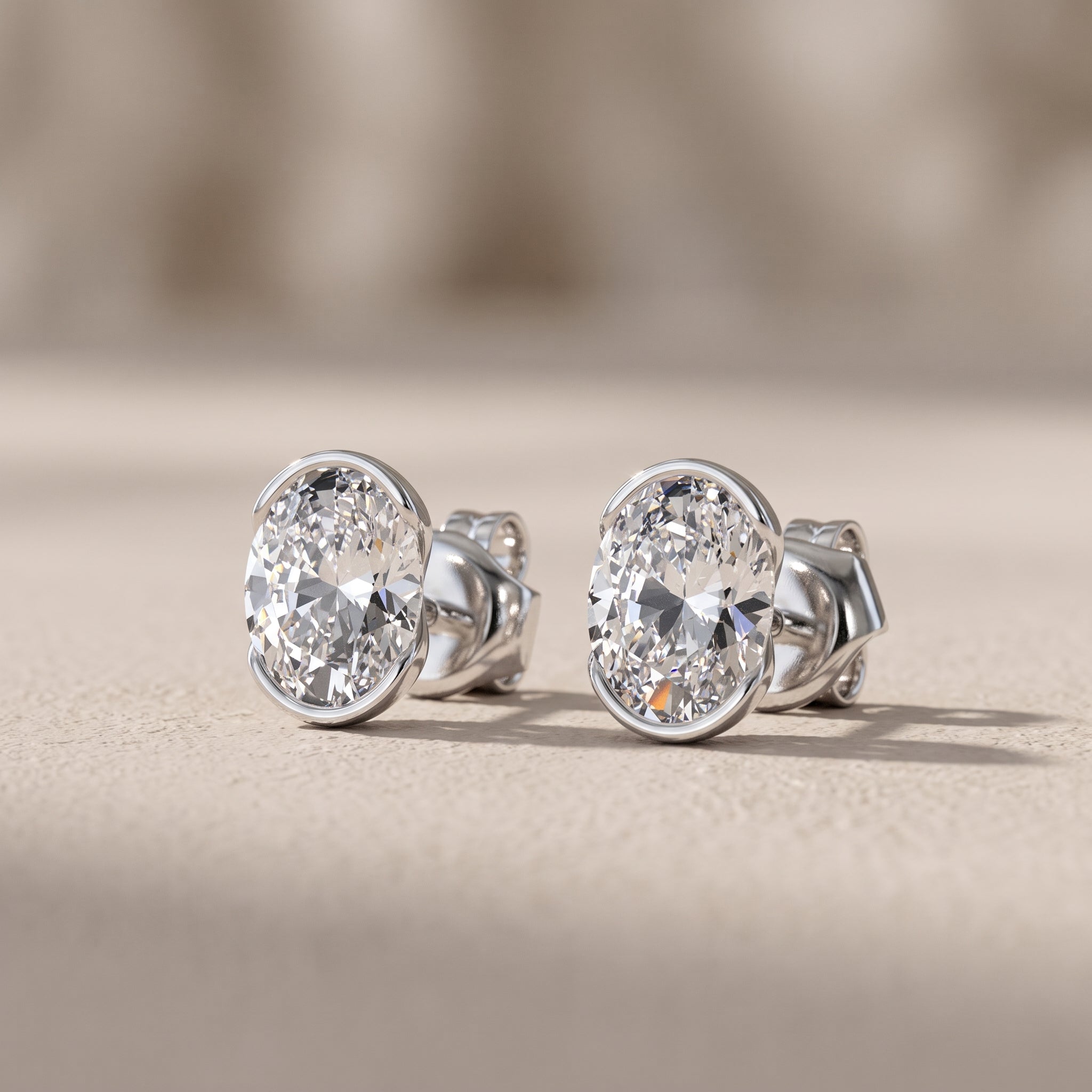 White Metal Oval Cut Moissanite Stud Earrings