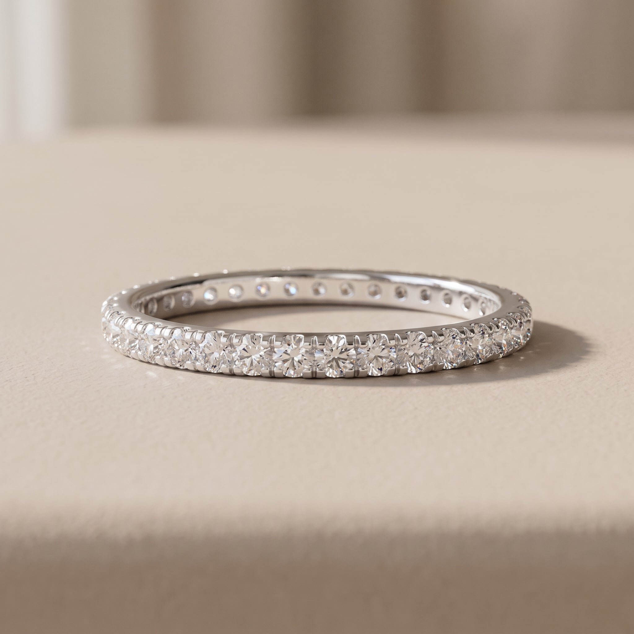 White Metal Round Moissanite Eternity Band Ring