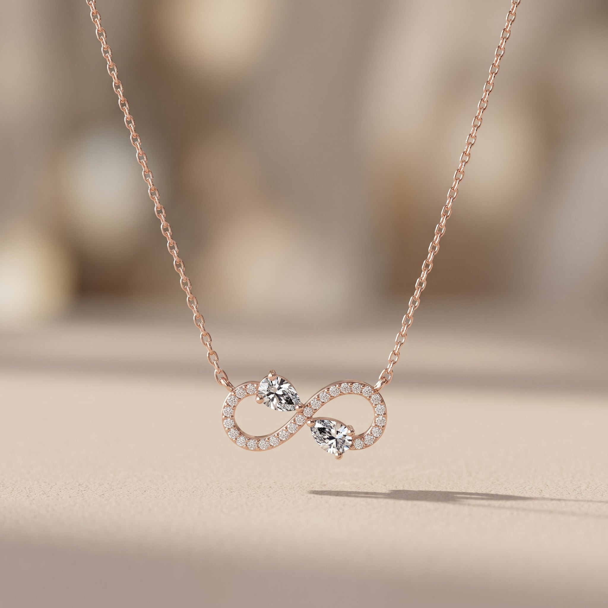 Rose Gold Pear Cut Moissanite Infinity Pendant Necklace