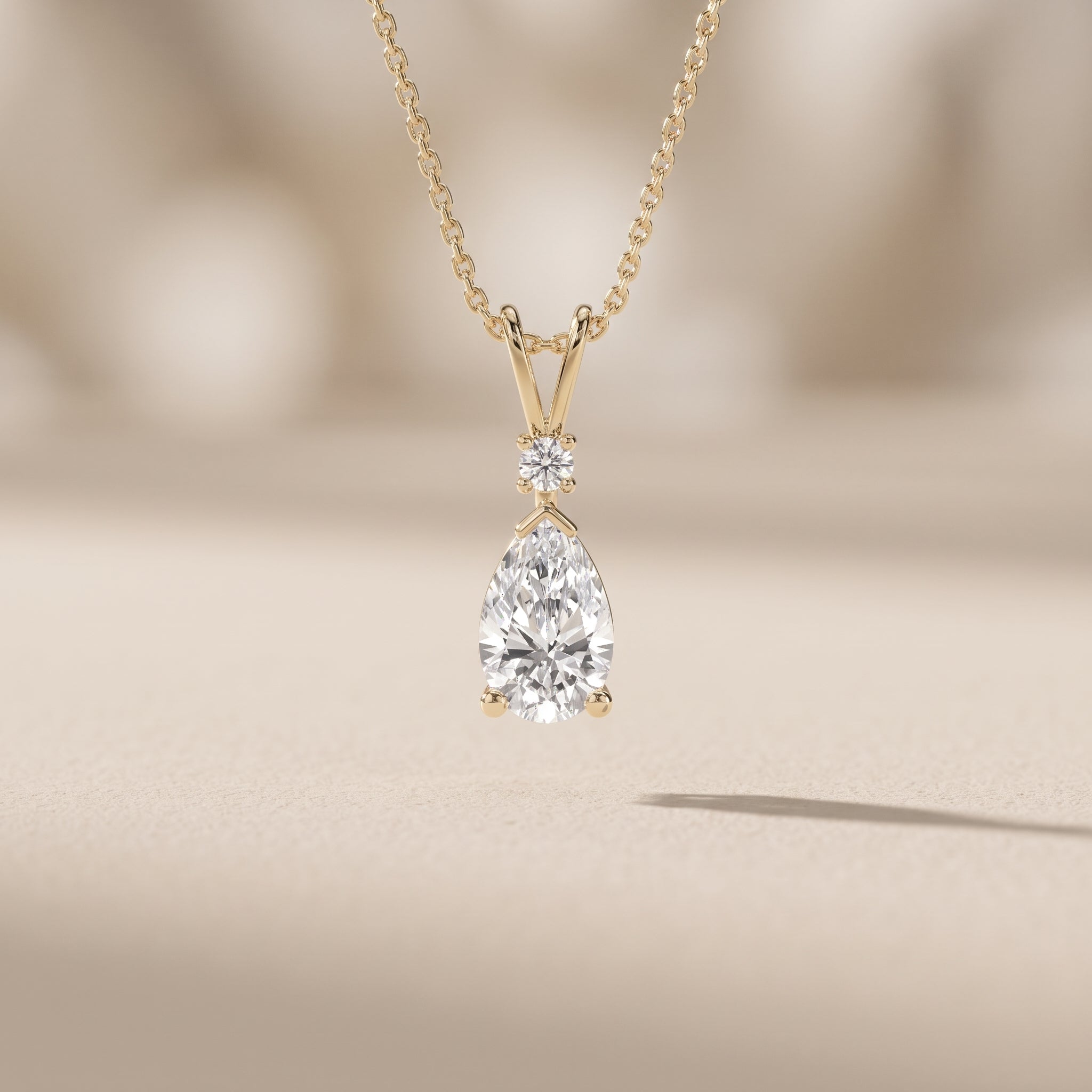 Yellow Gold Pear Cut Moissanite Pendant Necklace