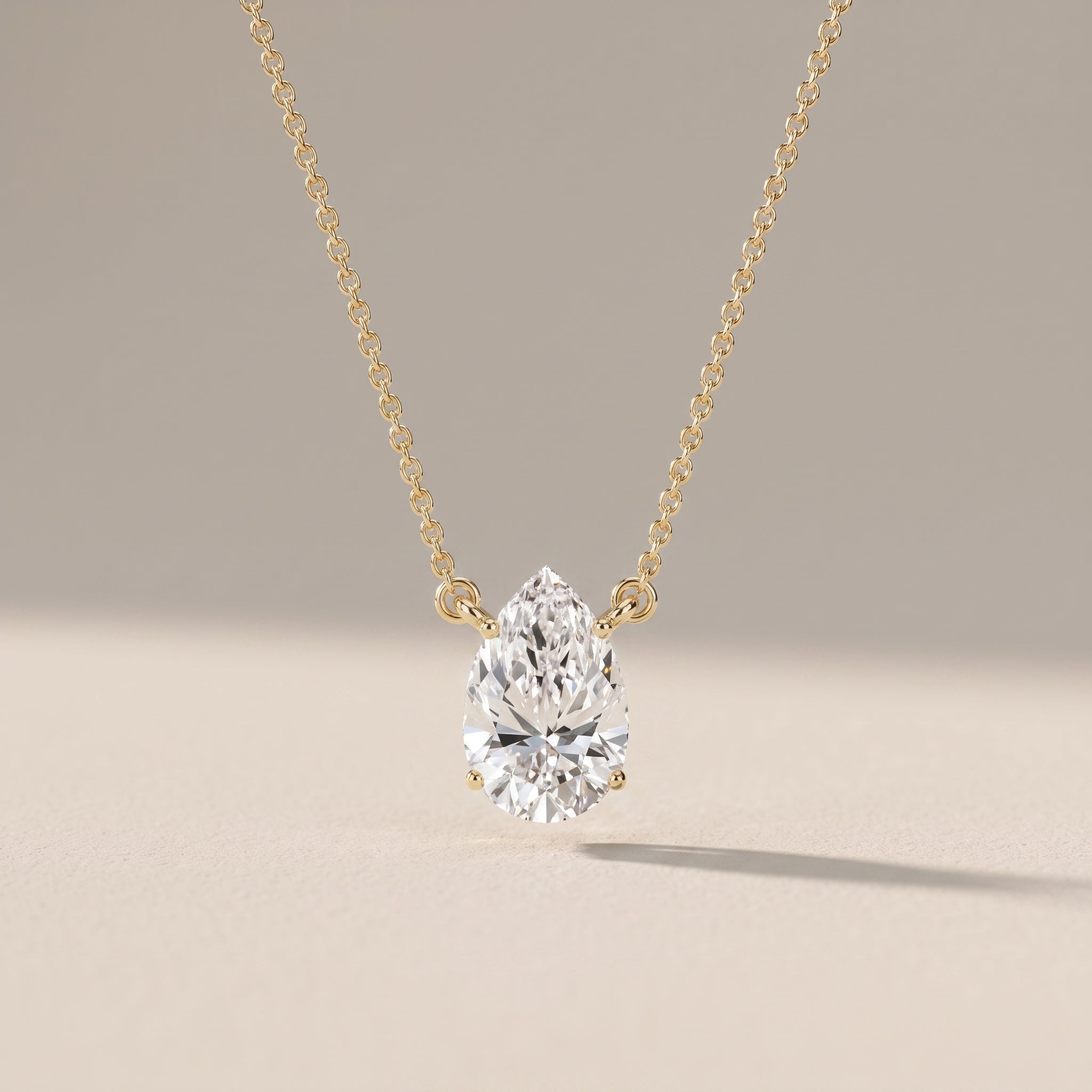 Yellow Gold Pear Cut Moissanite Pendant Necklace