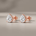 Rose Gold Pear Cut Moissanite Stud Earrings
