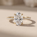 Yellow Gold Oval Moissanite Engagement Ring with Pavé Band