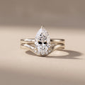 White Metal Pear Cut Moissanite Engagement Ring Set