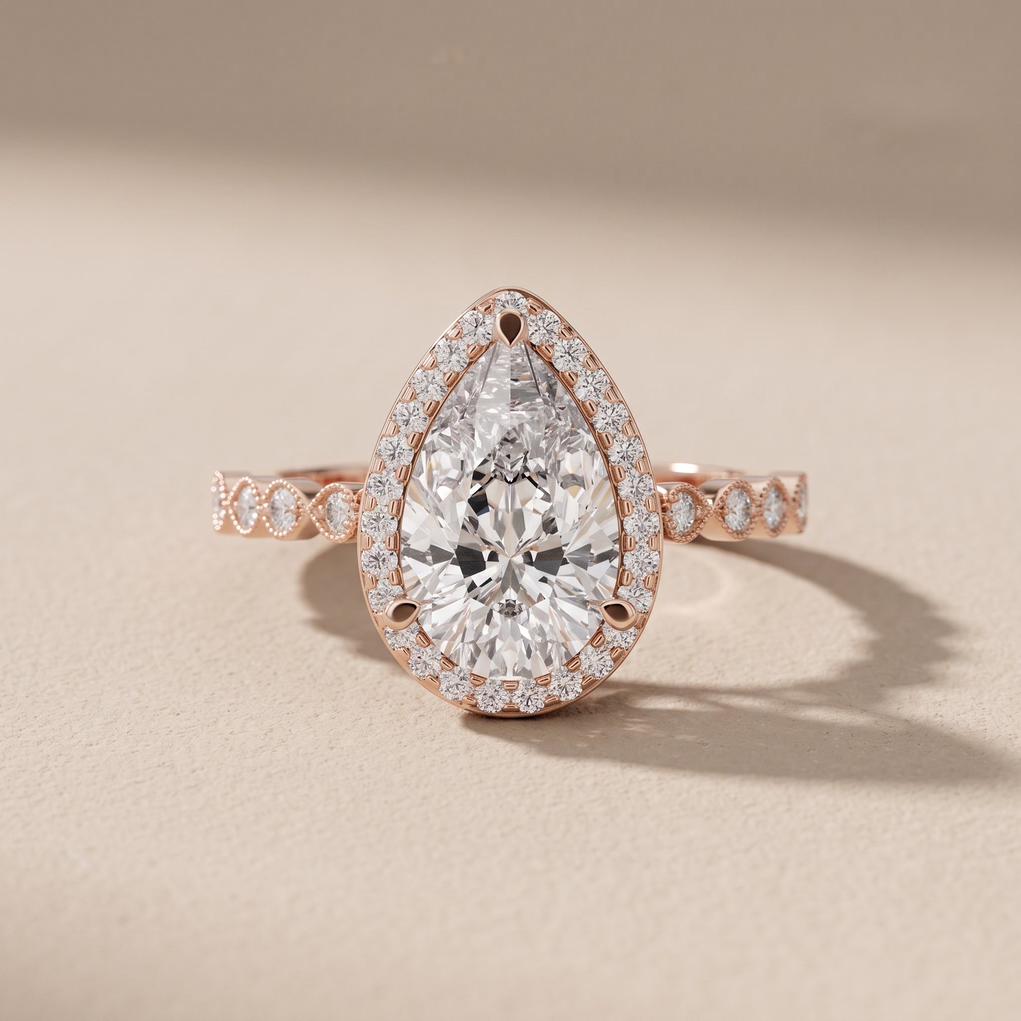 Rose Gold Pear Cut Moissanite Halo Engagement Ring