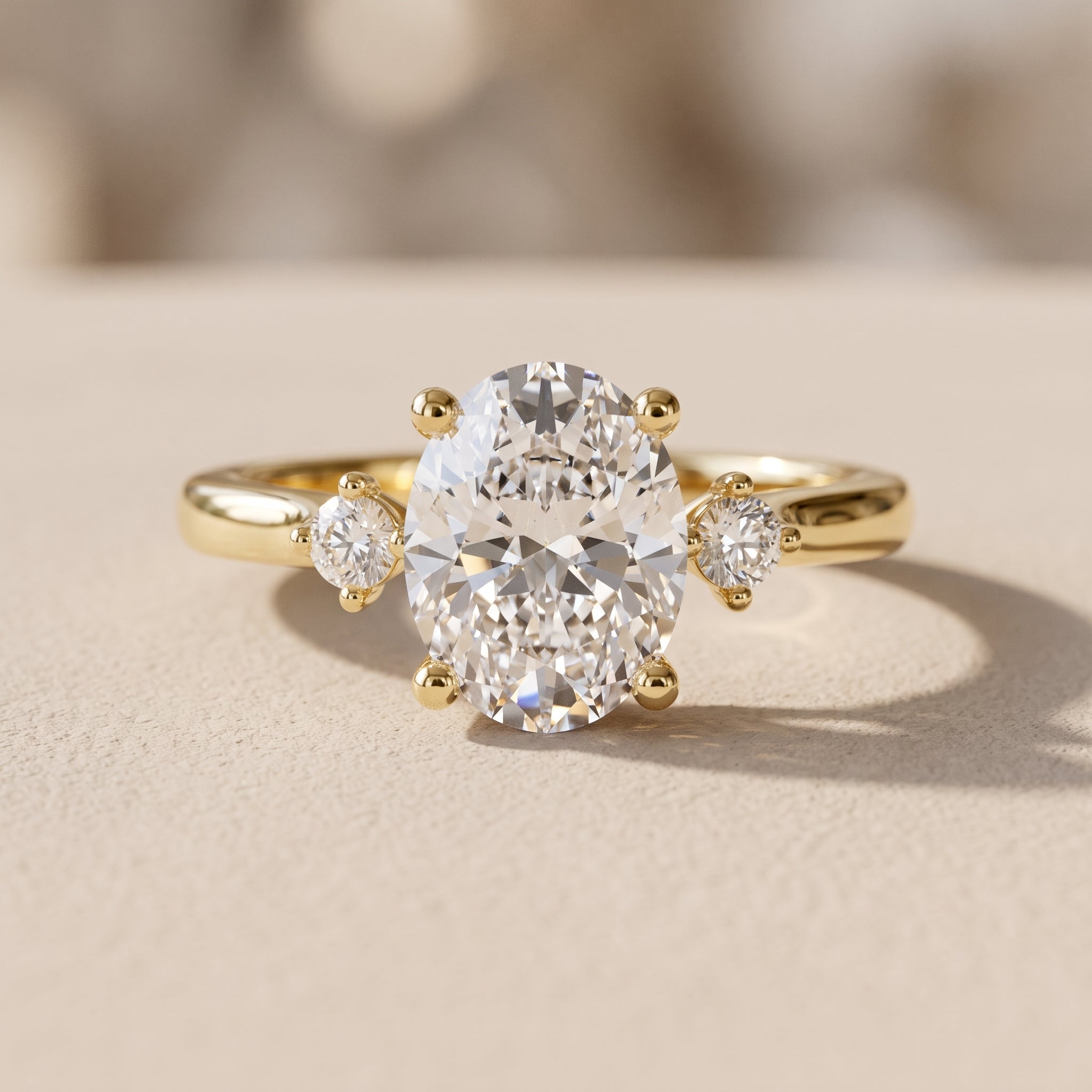 Yellow Gold Oval Moissanite Three-Stone Engagement Ring