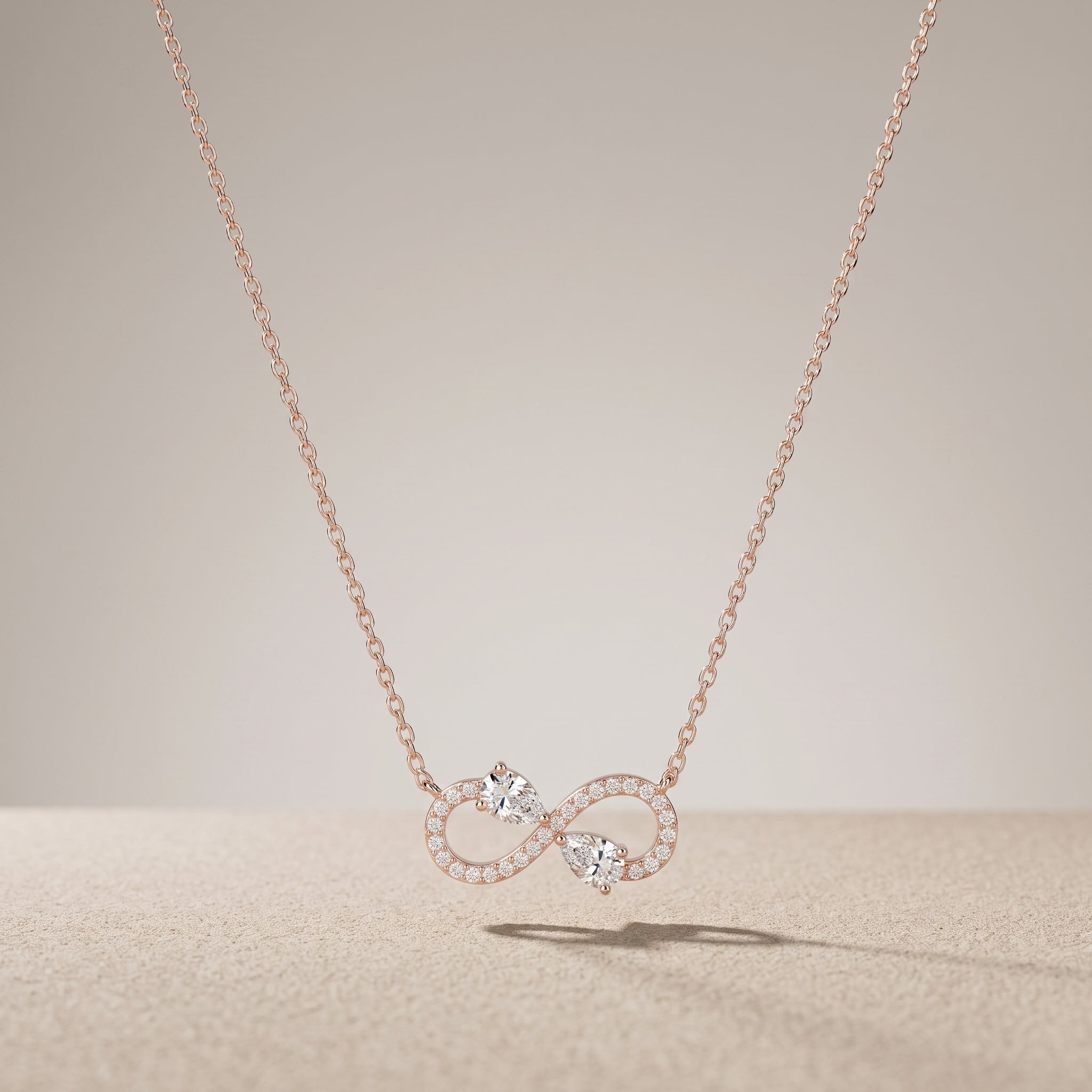 Rose Gold Pear Cut Moissanite Infinity Pendant Necklace