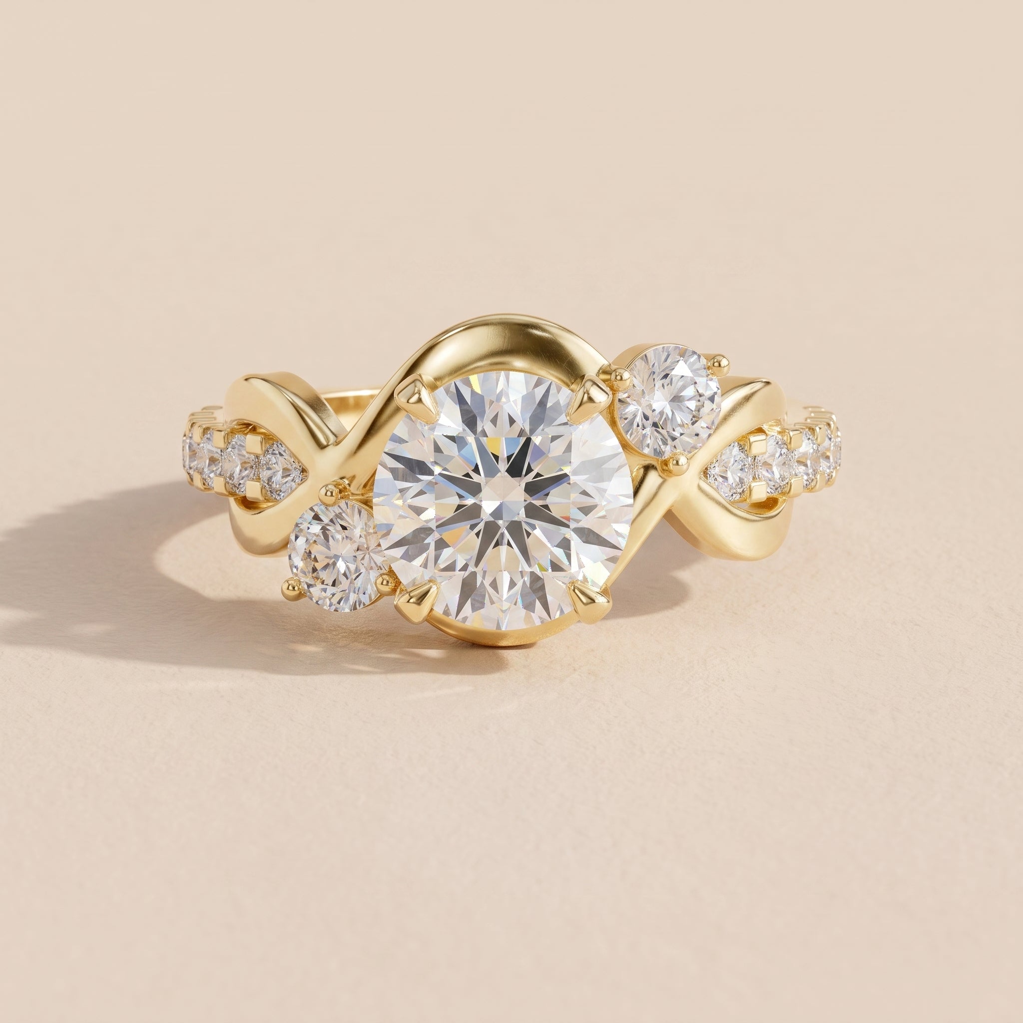 Yellow Gold Round Moissanite Twisted Three-Stone Engagement Ring