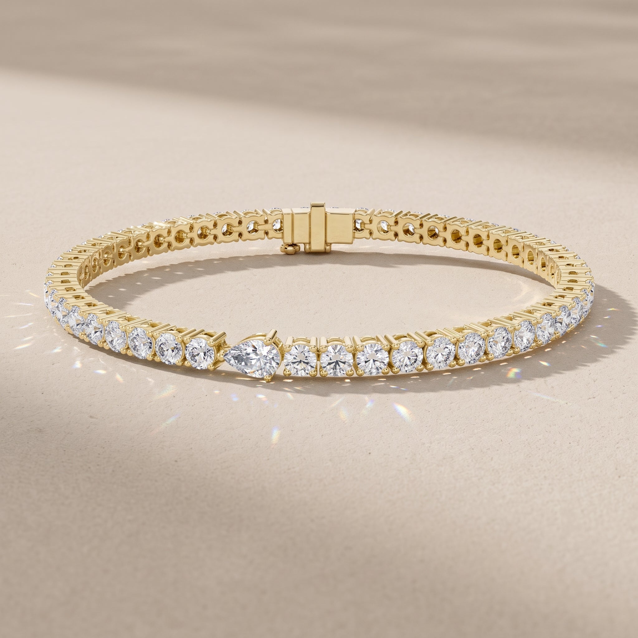 Yellow Gold Pear & Round Moissanite Tennis Bracelet