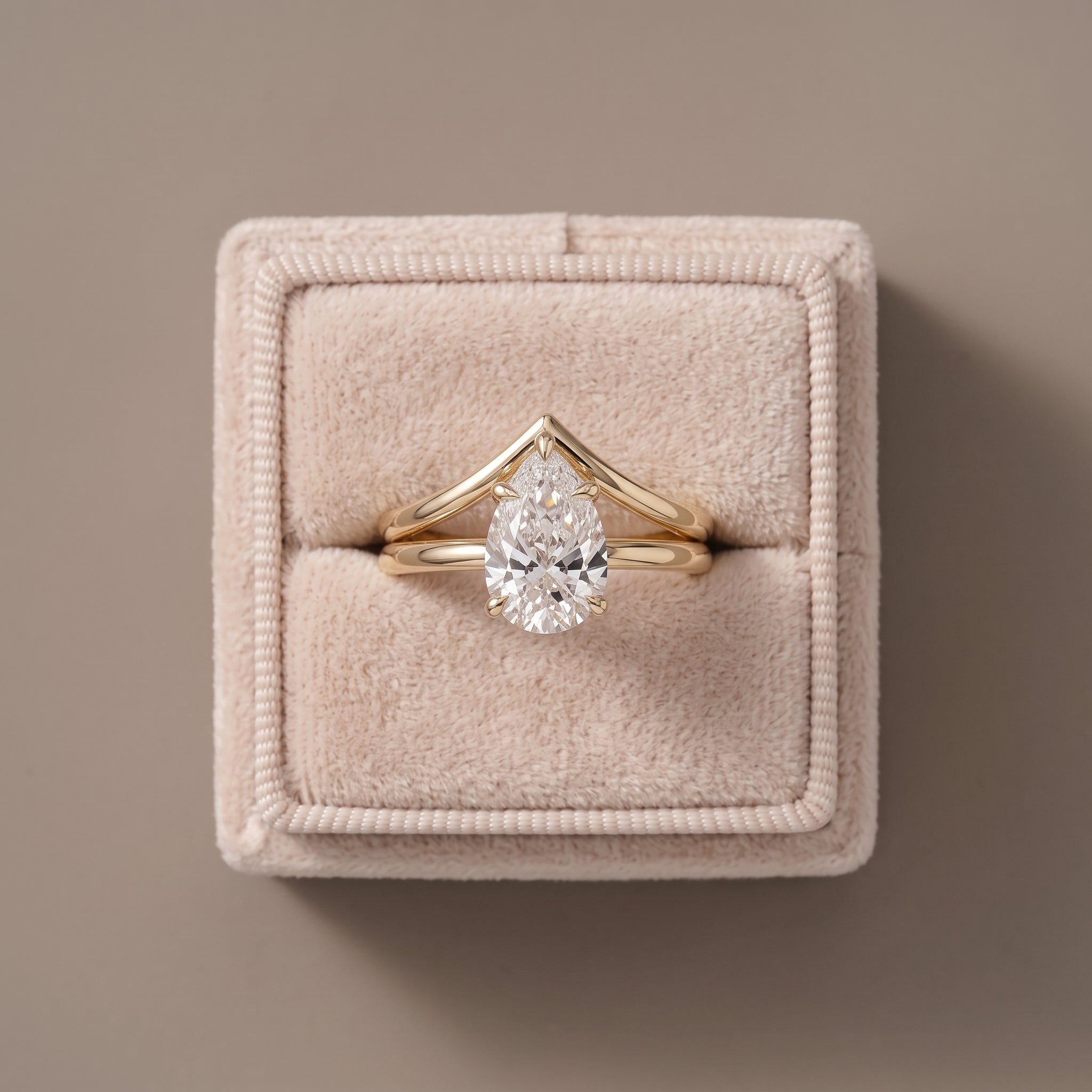 Yellow Gold Pear Cut Moissanite Engagement Ring with Chevron Band