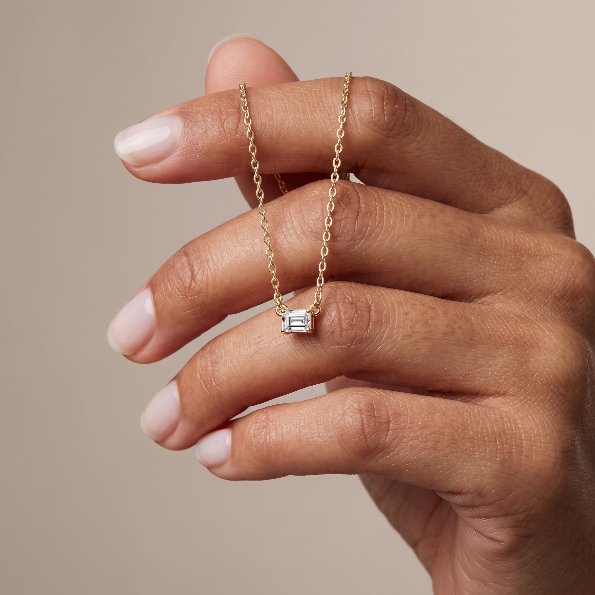 Yellow Gold Emerald Cut Moissanite Pendant Necklace