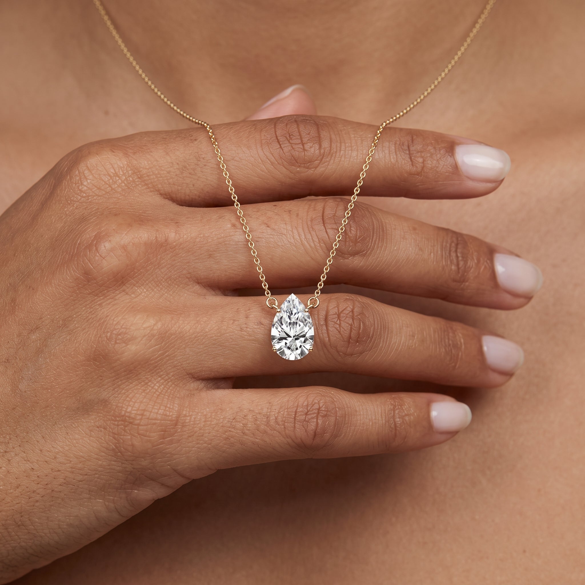 Yellow Gold Pear Cut Moissanite Pendant Necklace