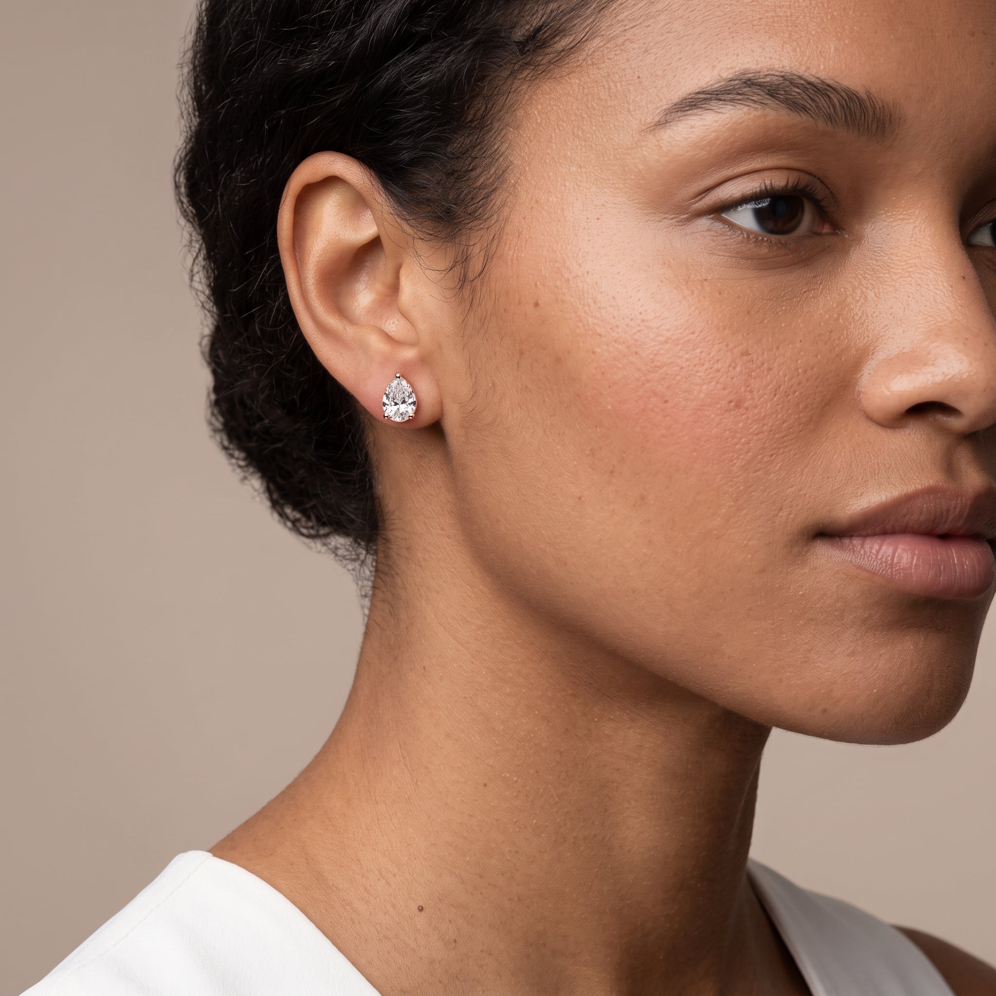 Rose Gold Pear Cut Moissanite Stud Earrings