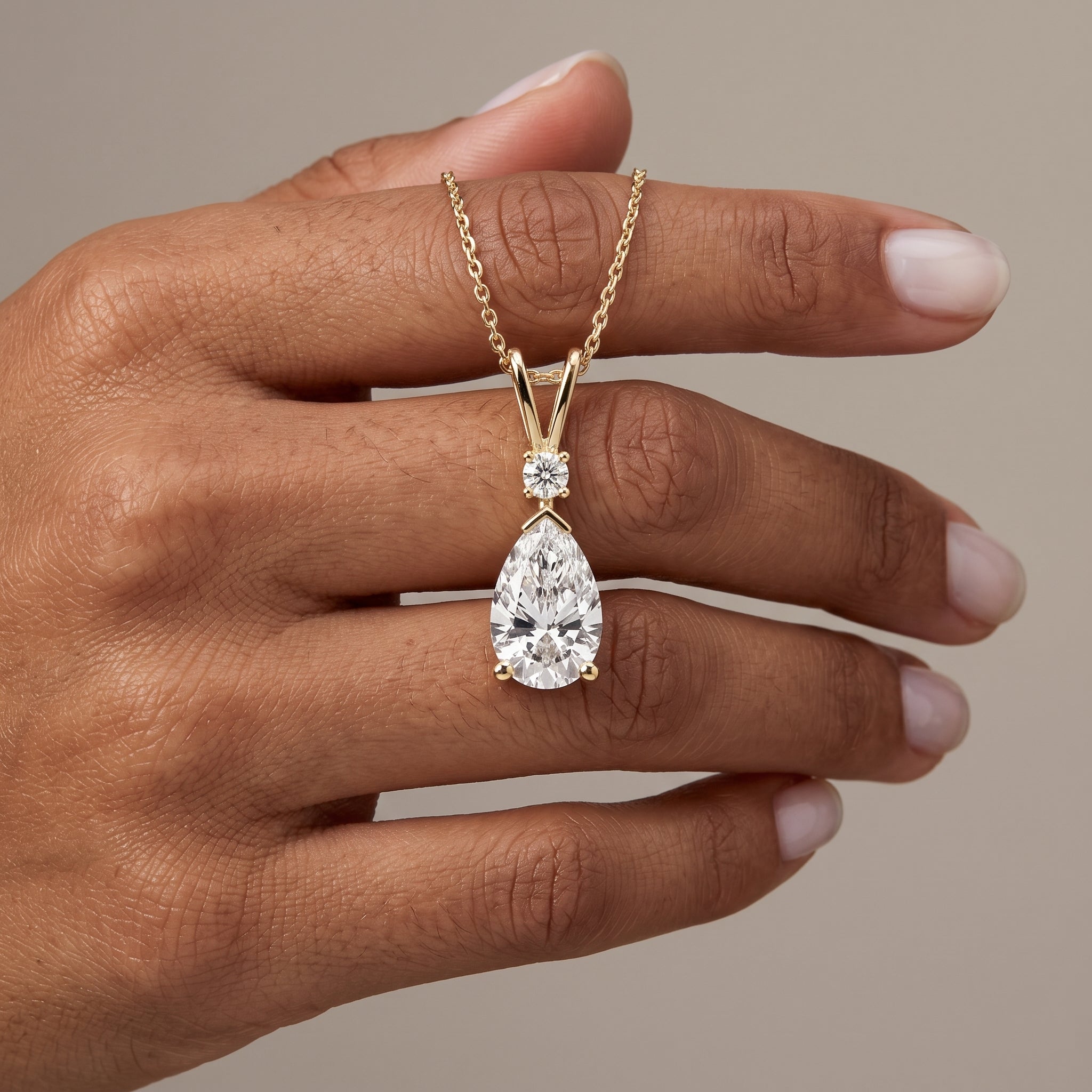Yellow Gold Pear Cut Moissanite Pendant Necklace