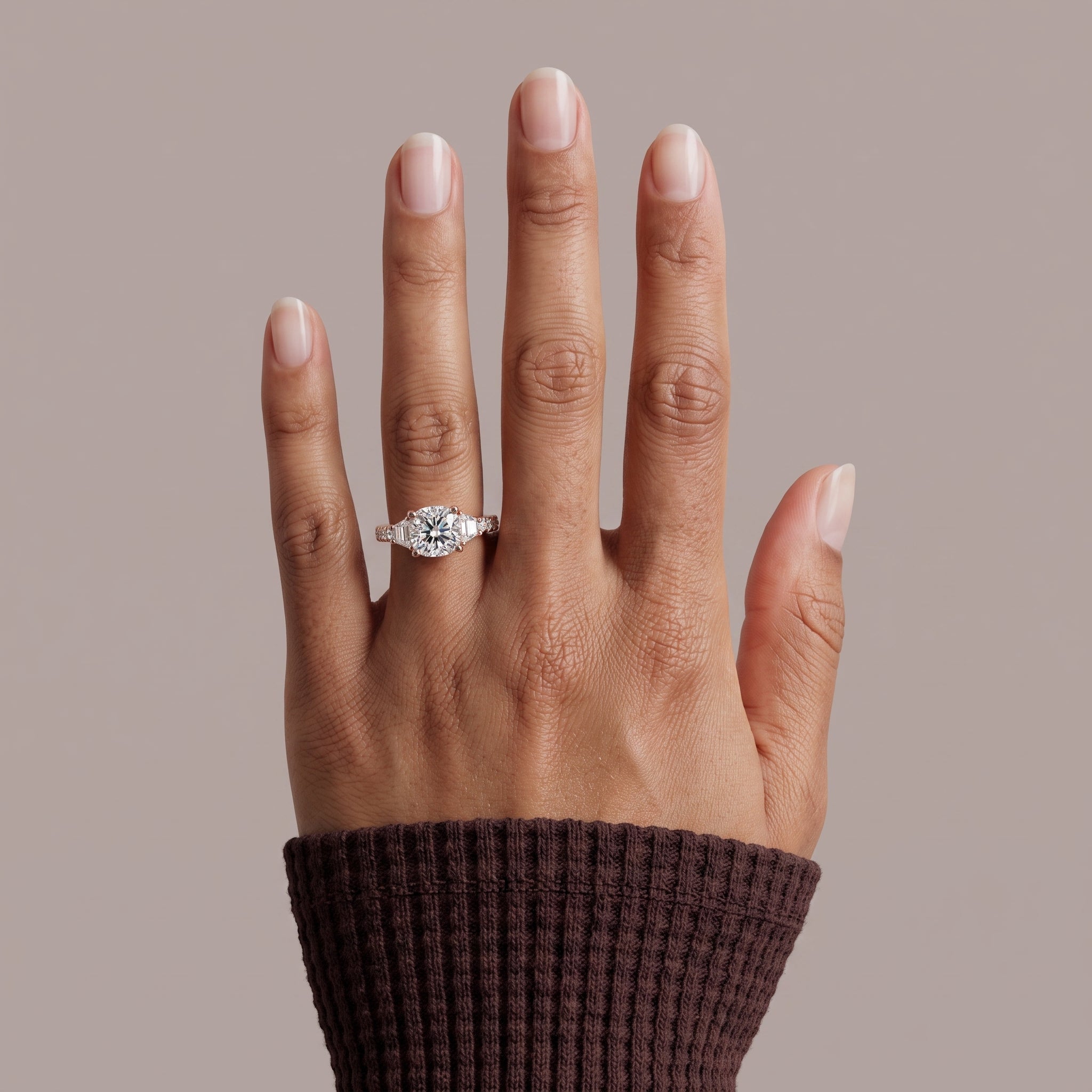Rose Gold Round Moissanite Engagement Ring with Tapered Side Stones