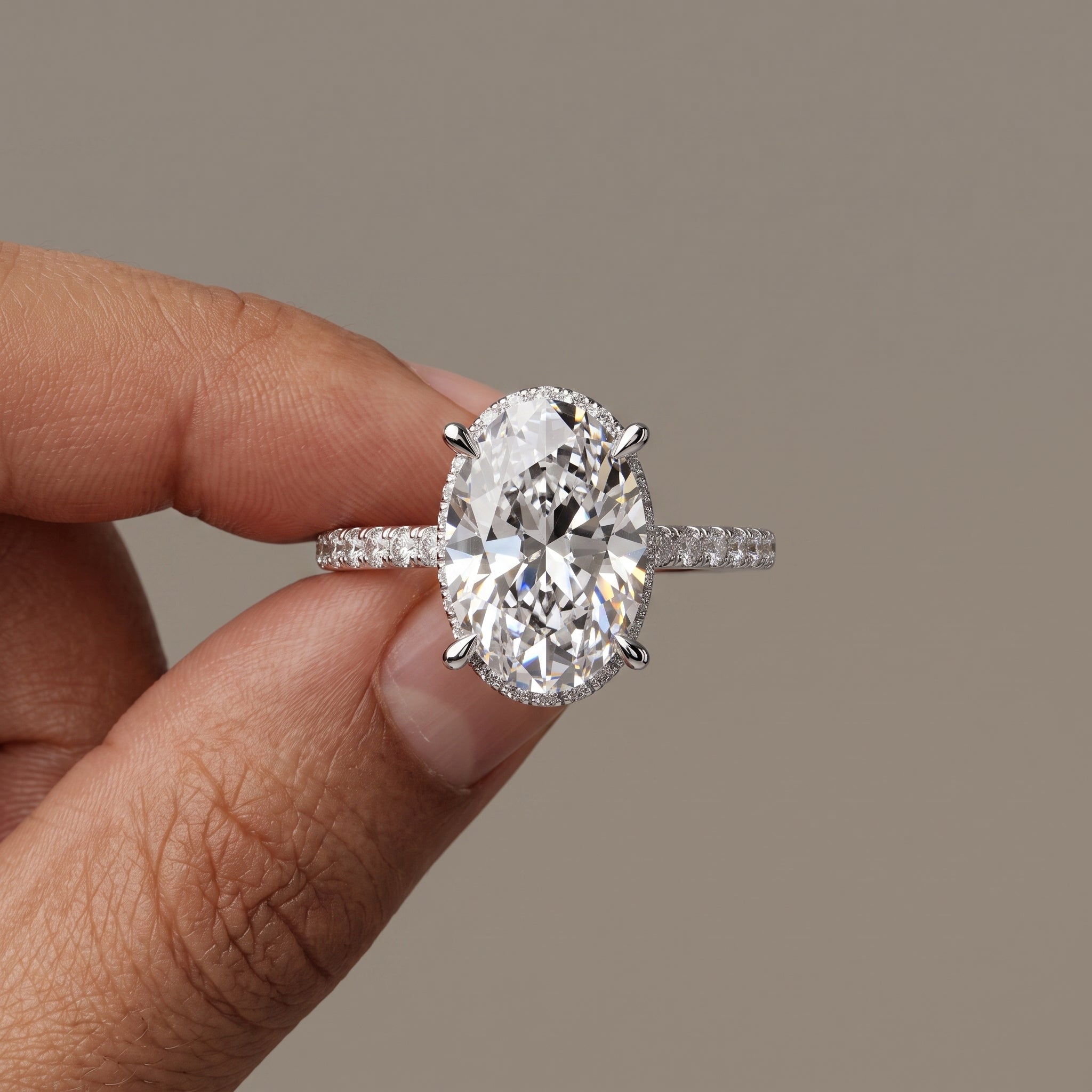 White Gold Oval Cut Moissanite Engagement Ring with Pavé Band