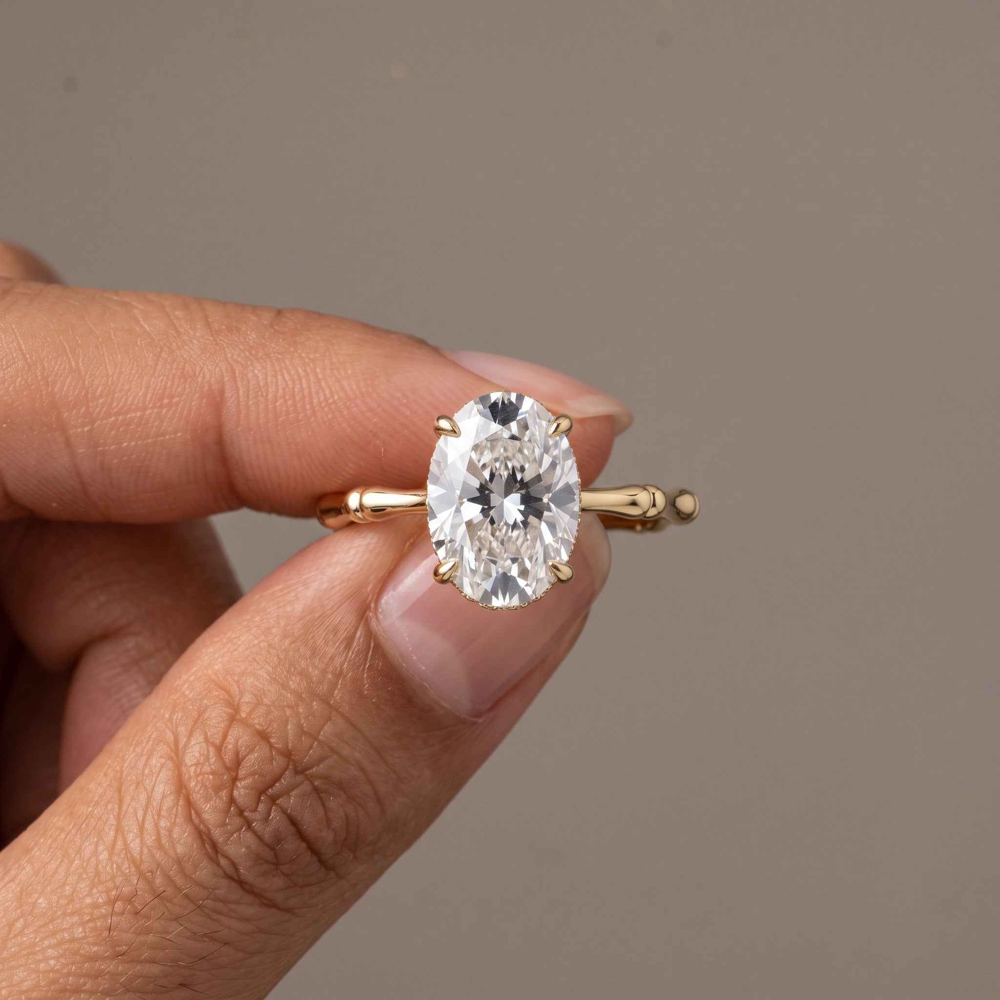 Yellow Gold Oval Cut Moissanite Engagement Ring