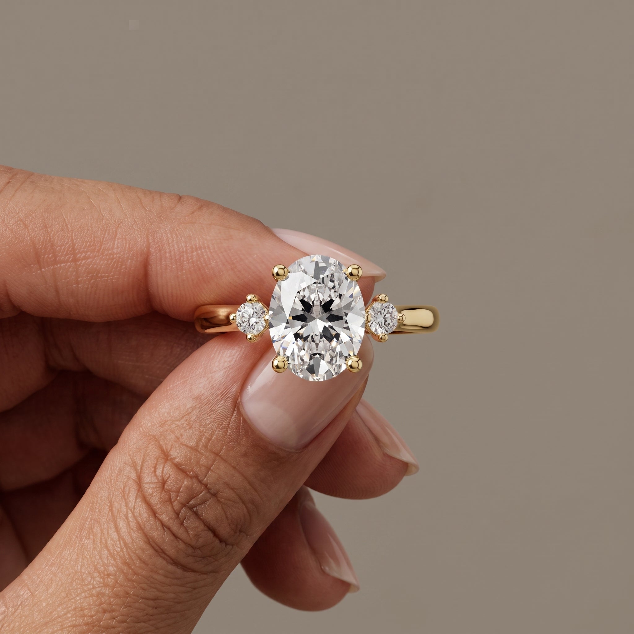 Yellow Gold Oval Moissanite Three-Stone Engagement Ring