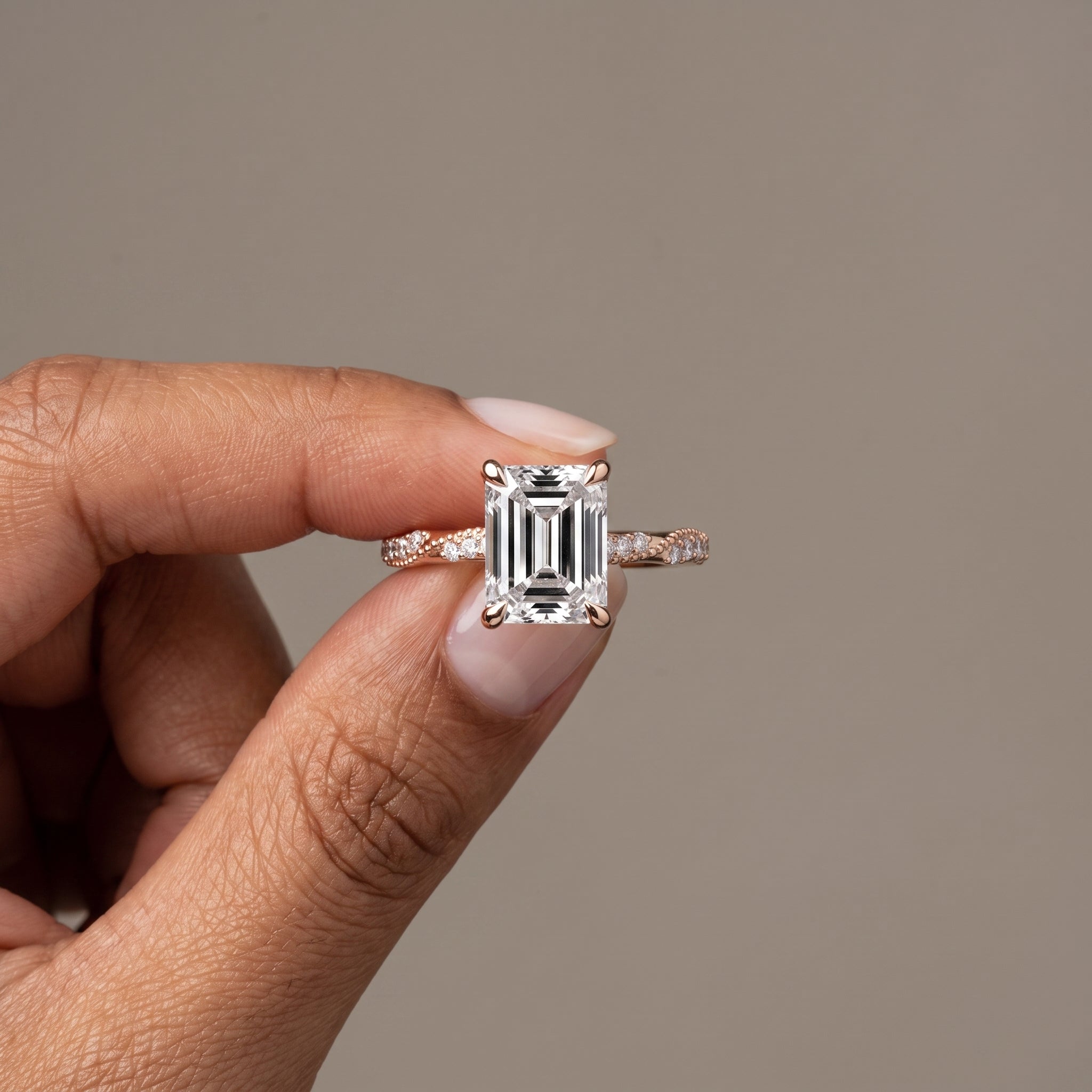 Rose Gold Emerald Cut Moissanite Engagement Ring