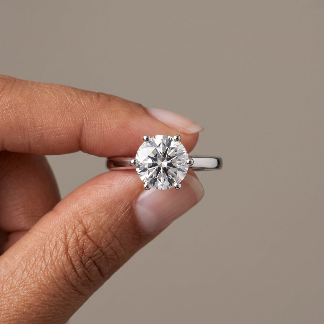 White Metal Round Brilliant Moissanite Solitaire Engagement Ring