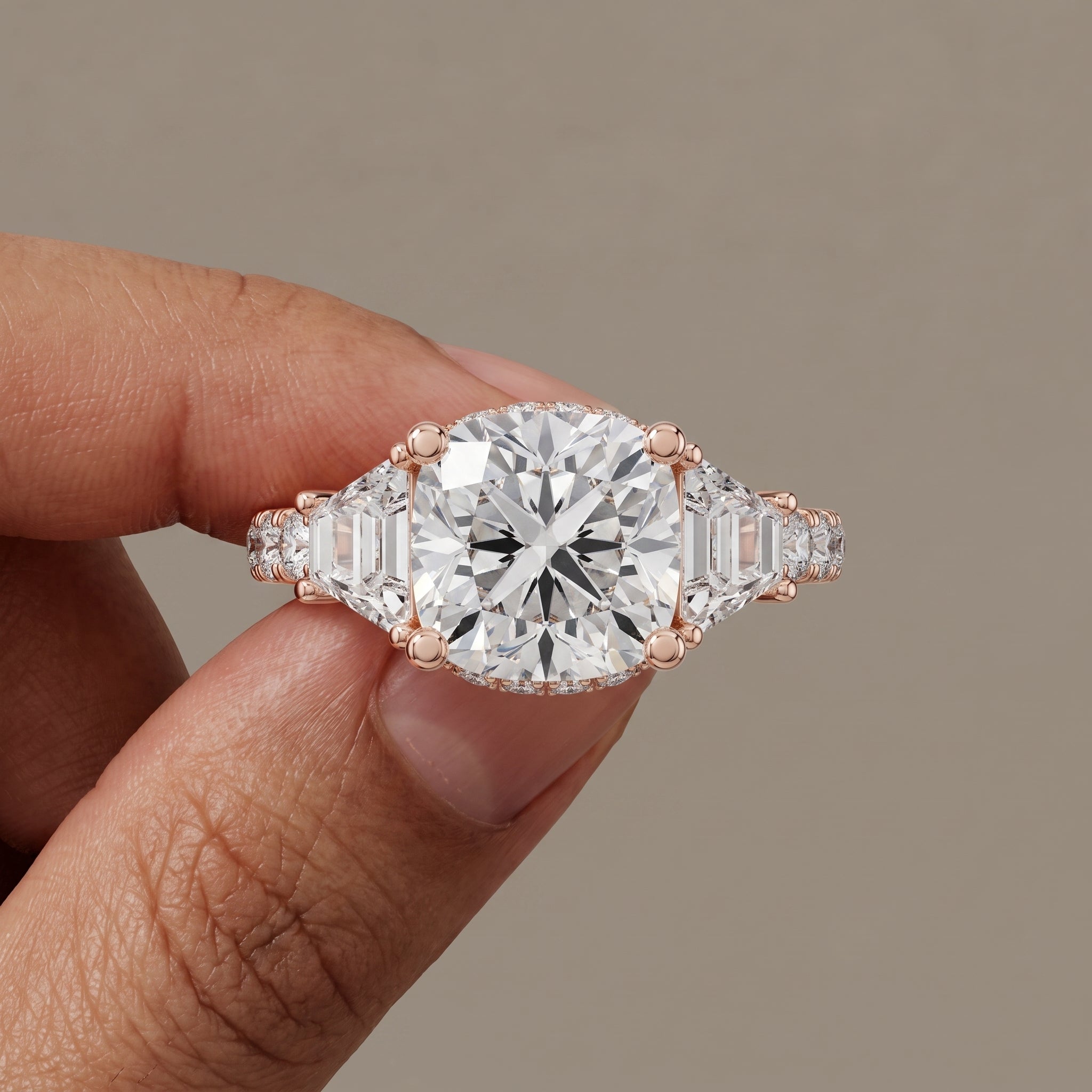 Rose Gold Round Moissanite Engagement Ring with Tapered Side Stones