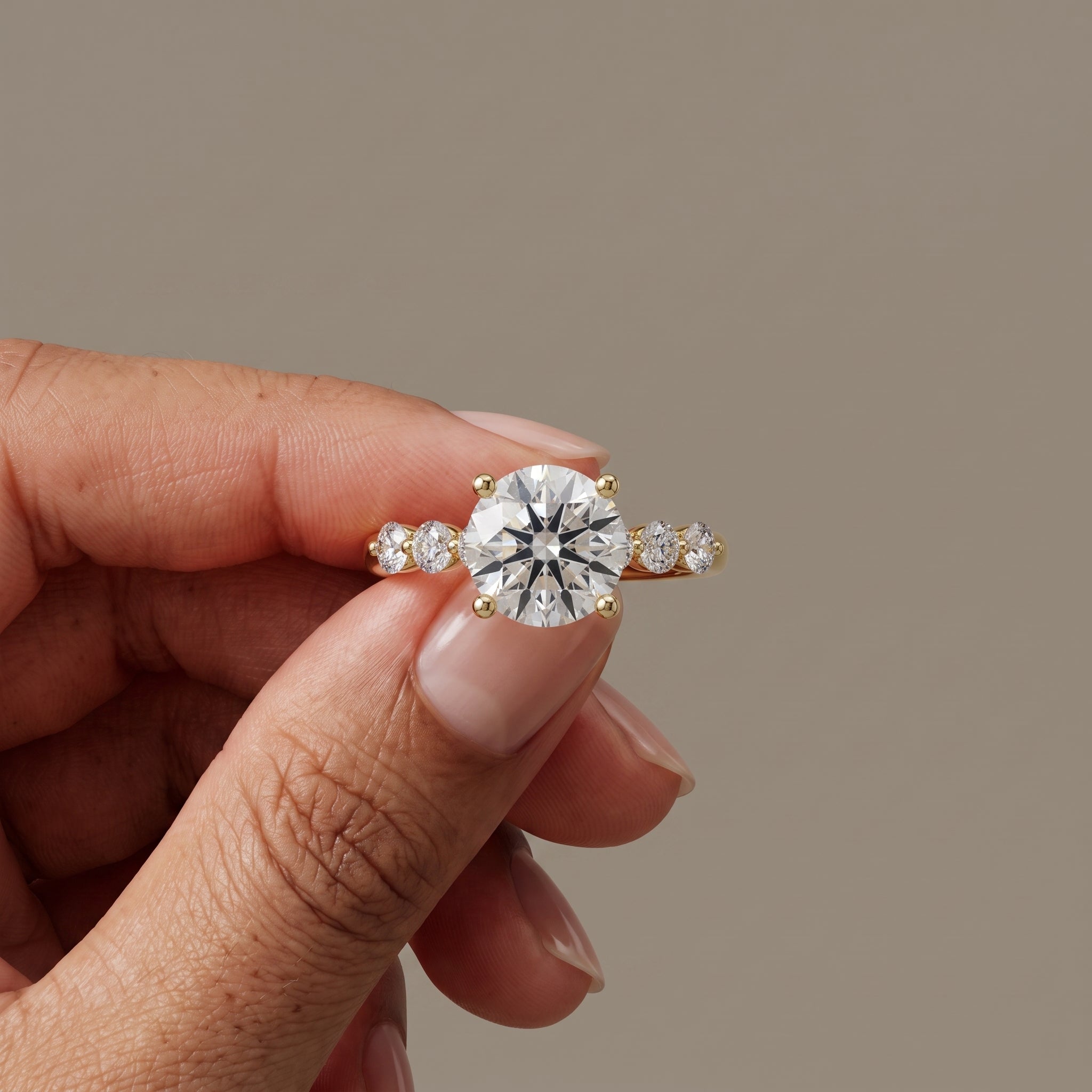 Yellow Gold Round Moissanite Engagement Ring with Side Stones