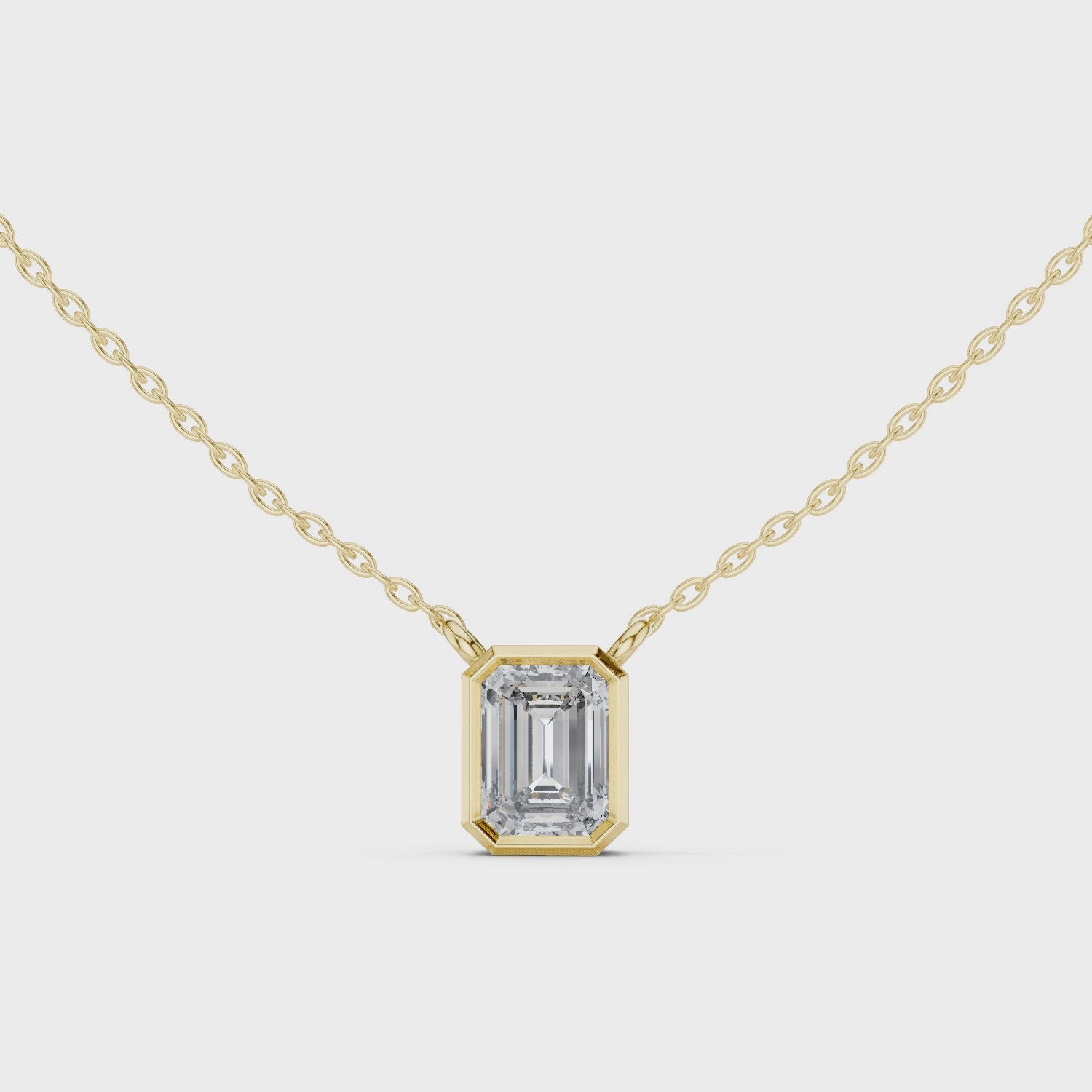 Emerald Cut Bezel Moissanite Pendant in Rose Gold