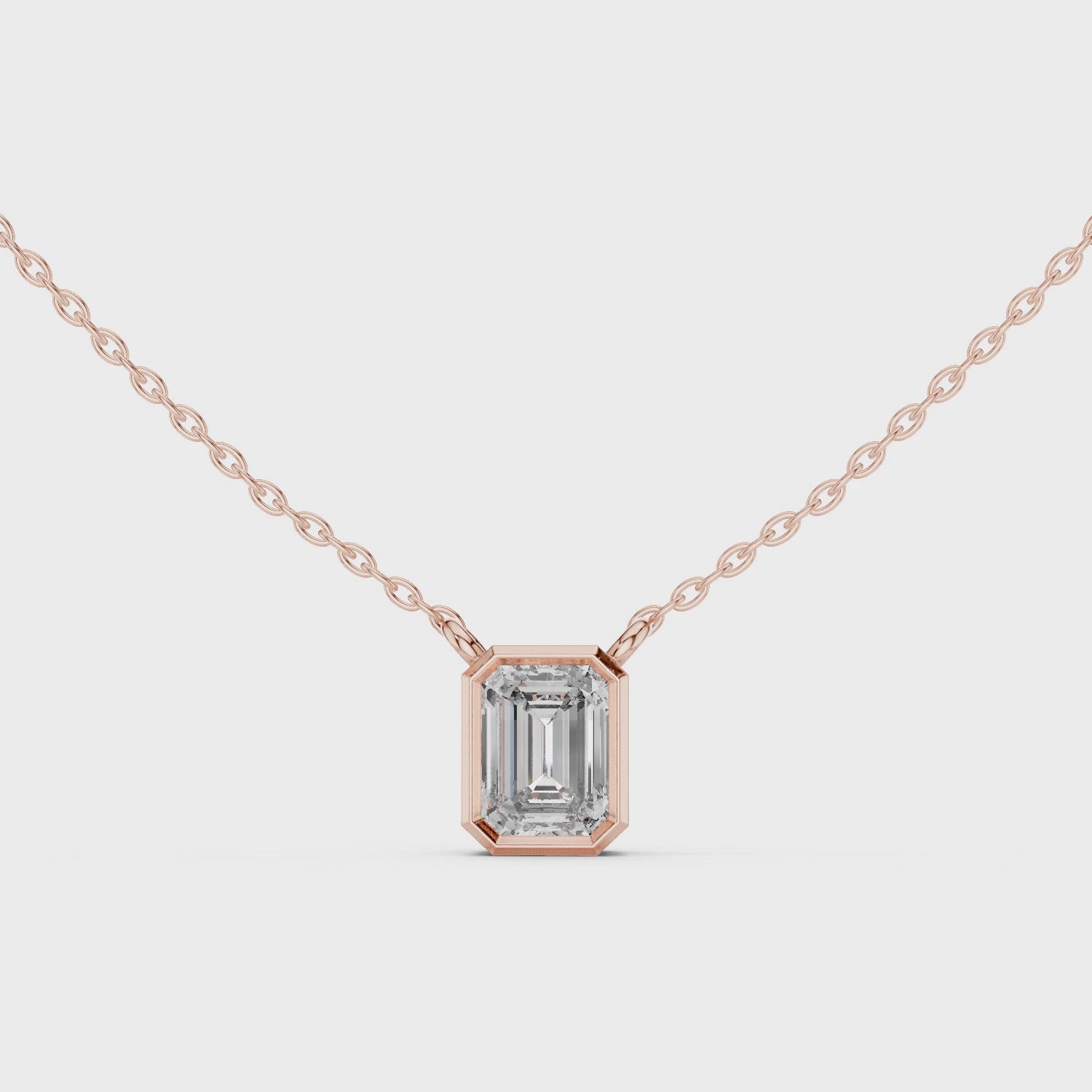 Emerald Cut Bezel Moissanite Pendant in Rose Gold