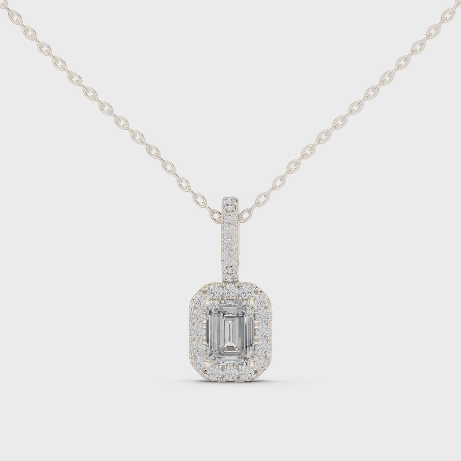 Emerald Cut Halo Moissanite Pendant in Yellow Gold