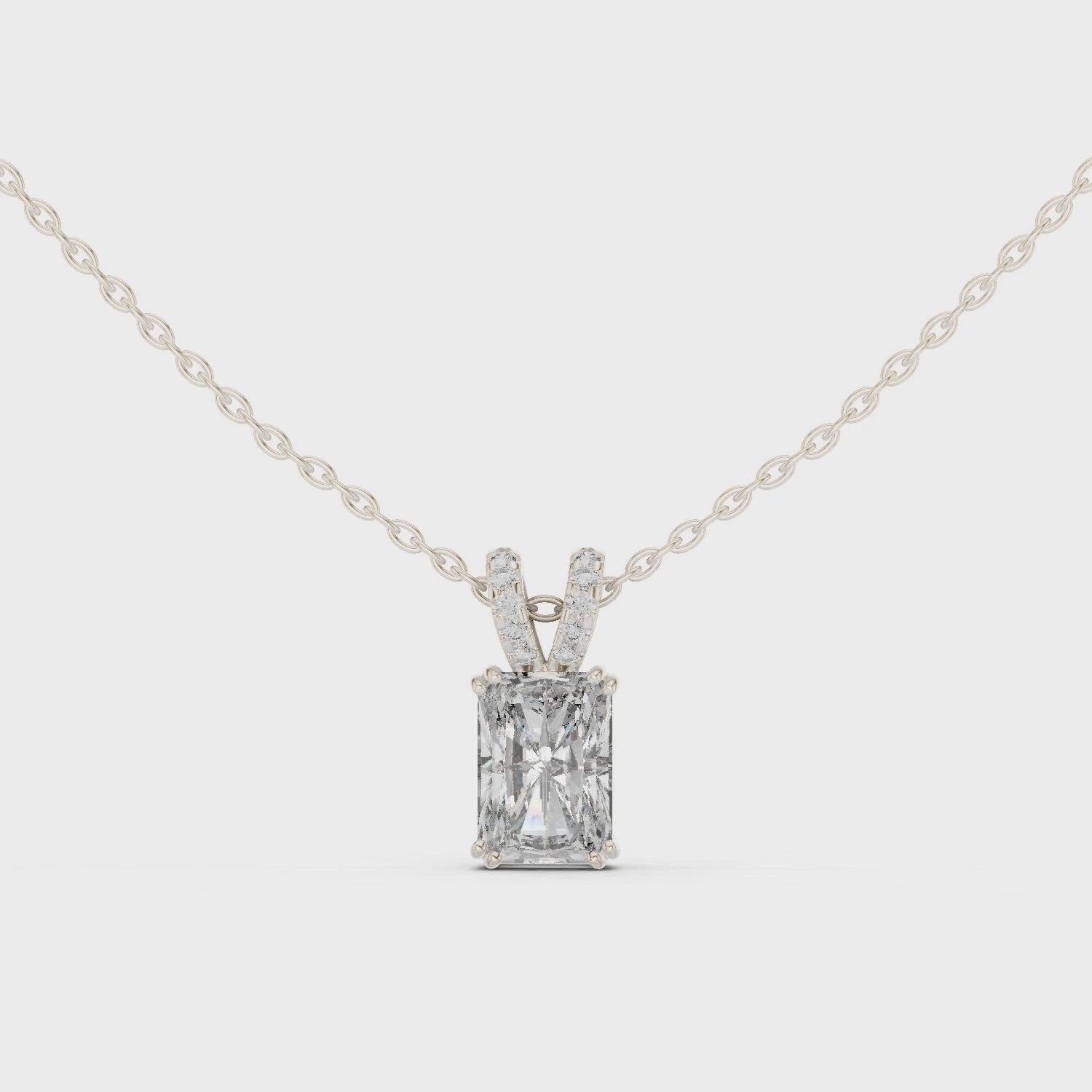 Radiant Lock Design Moissanite Pendant in White Gold