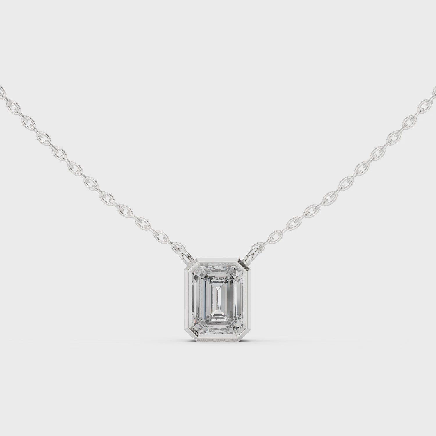 Emerald Cut Bezel Moissanite Pendant in Rose Gold