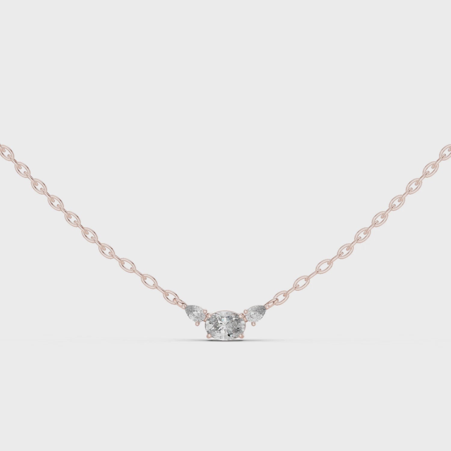 Oval Three Stone Moissanite Pendant in Yellow Gold