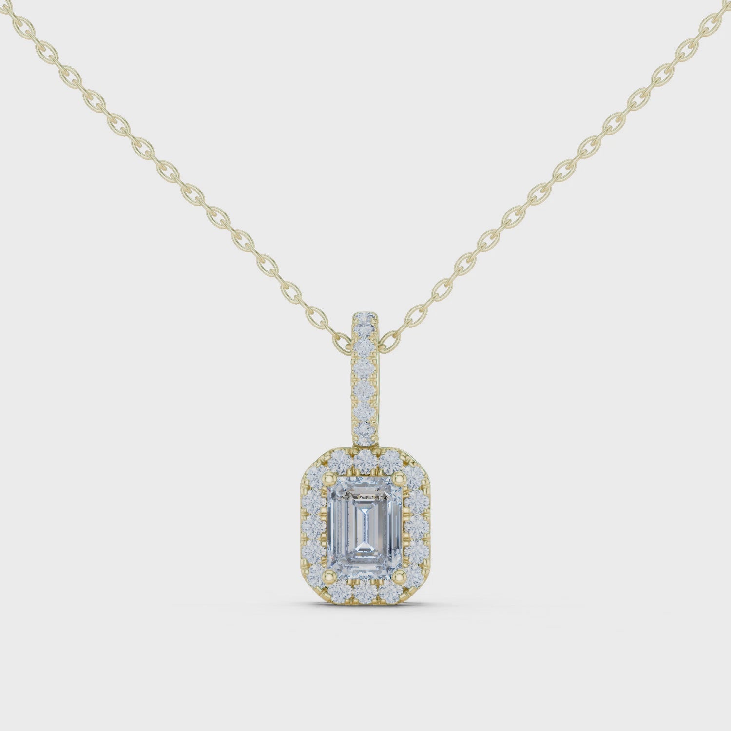 Emerald Cut Halo Moissanite Pendant in Yellow Gold