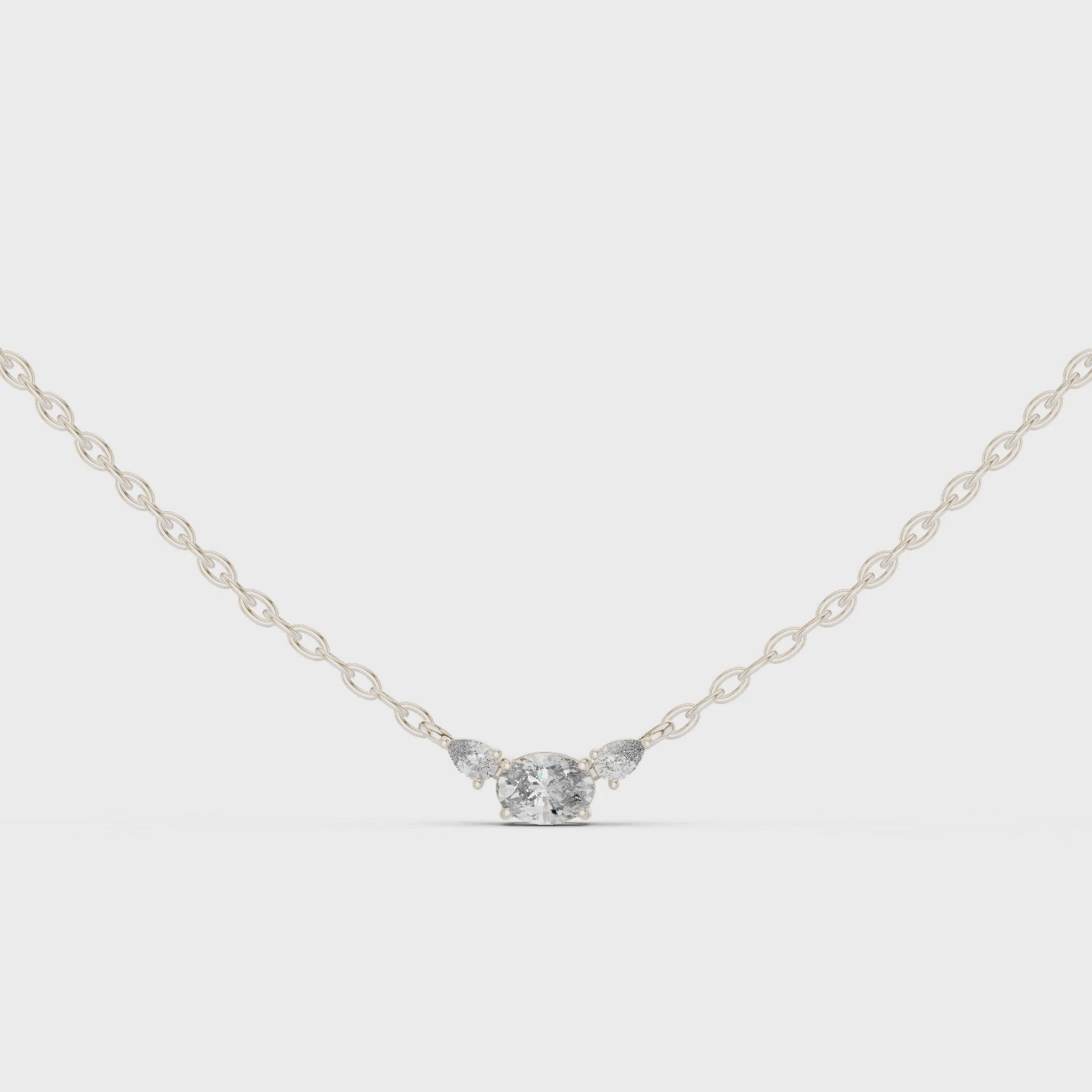 Oval Three Stone Moissanite Pendant in Yellow Gold